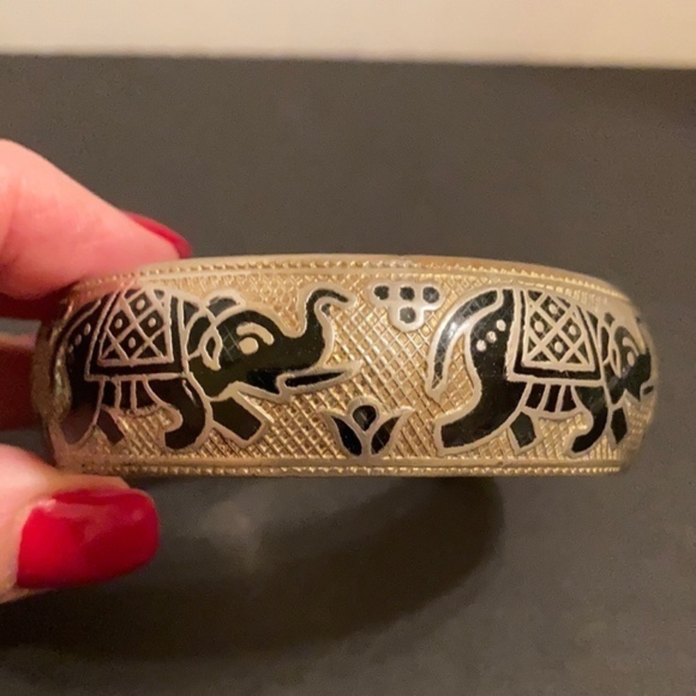 Lucky elephant gold tone and blue enamel bangle
